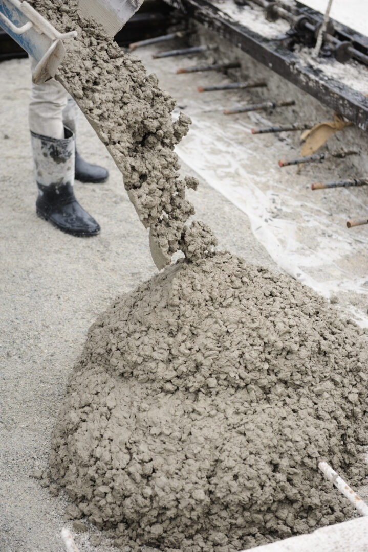 Concrete workers in Tulsa pouring concrete.